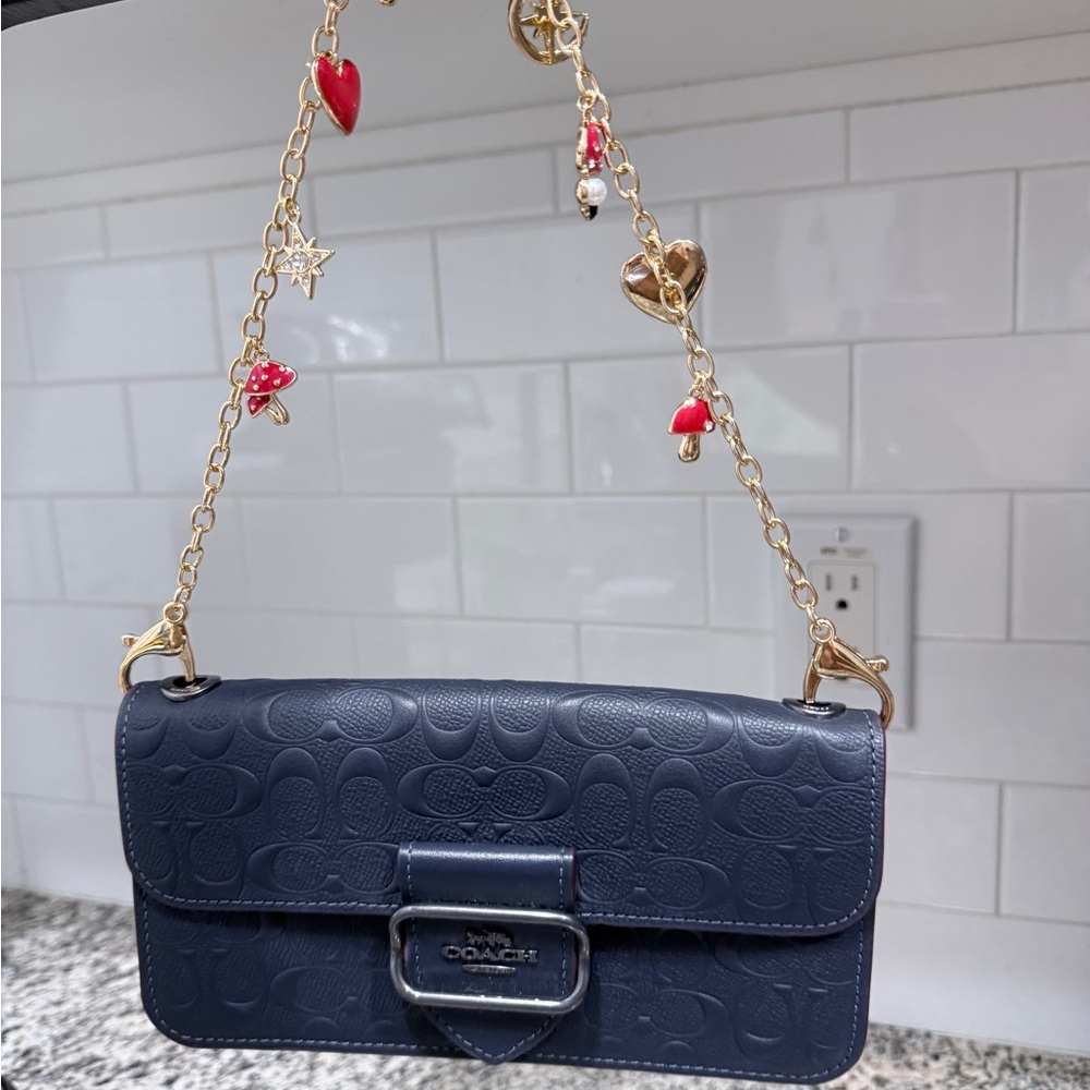 Coach Dark Blue Embossed Clutch with Gold Accents